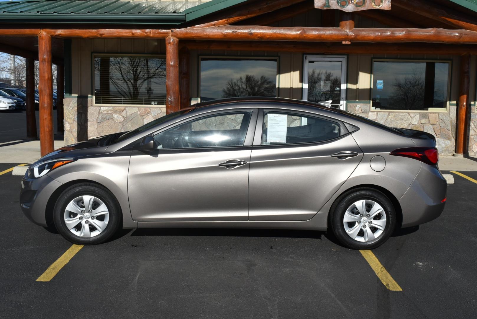 2016 Bronze Hyundai Elantra SE (5NPDH4AE3GH) with an 1.8L 4 Cyl engine, 6-Speed Automatic transmission, located at 1600 E Hwy 44, Rapid City, SD, 57703, (605) 716-7878, 44.070232, -103.171410 - Photo#3